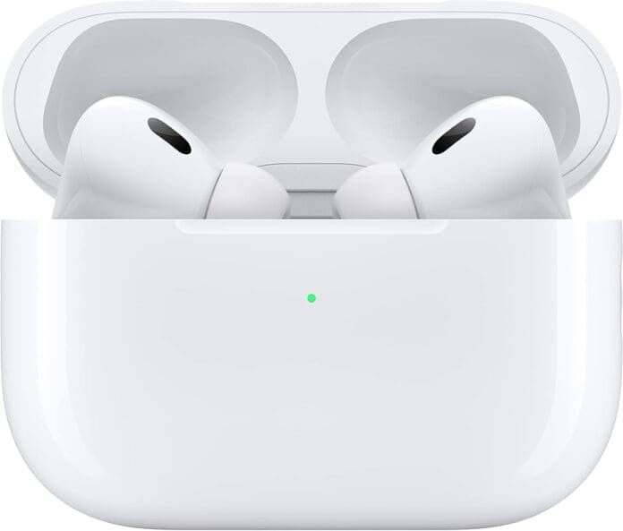 Apple AirPods Pro (2nd Generation) placed inside their white charging case, with a green LED indicator light on the front, showcasing their compact design and wireless charging functionality.