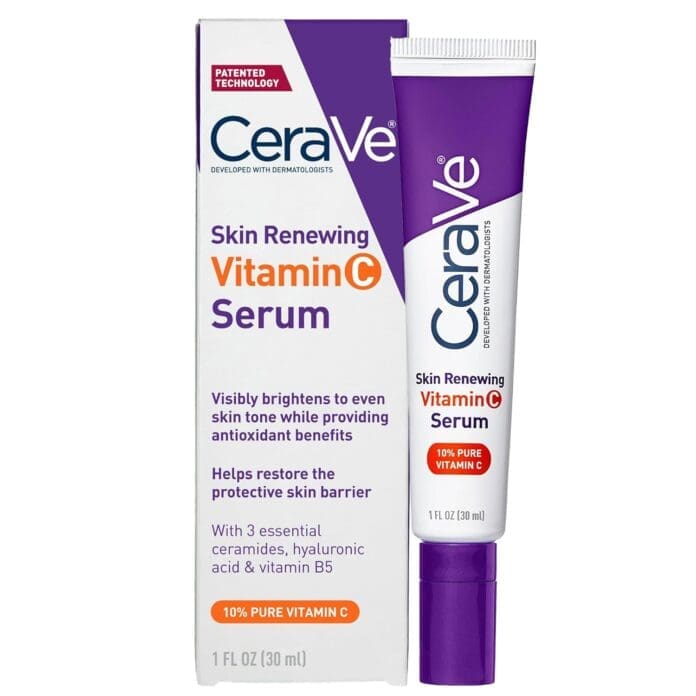 A close-up image of the CeraVe Skin Renewing Vitamin C Serum in its updated packaging. The product box and tube are displayed prominently, featuring a white and purple color scheme. The front of the packaging highlights key benefits such as 