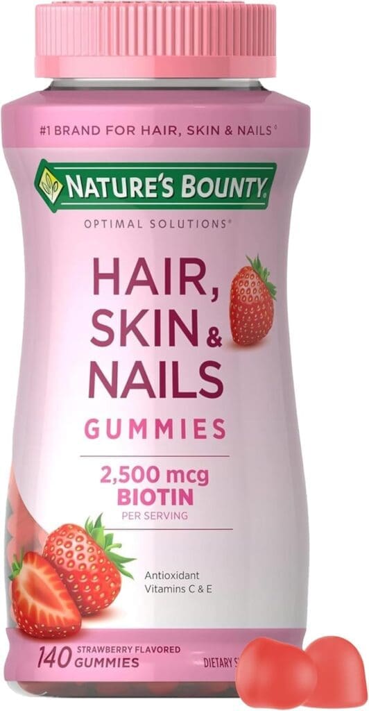 A bottle of Nature’s Bounty Hair, Skin & Nails Gummies with 2,500 mcg of biotin per serving, enriched with vitamins C and E, promoting beauty and wellness, with strawberry flavor and 140 gummies per container.